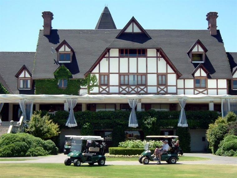 Carts waiting at the clubhouse